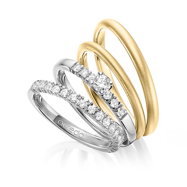 Set in witgoud 18 kt. half gezet met in totaal 0,59 ct. Briljant & Briljanten tw/si van acredo