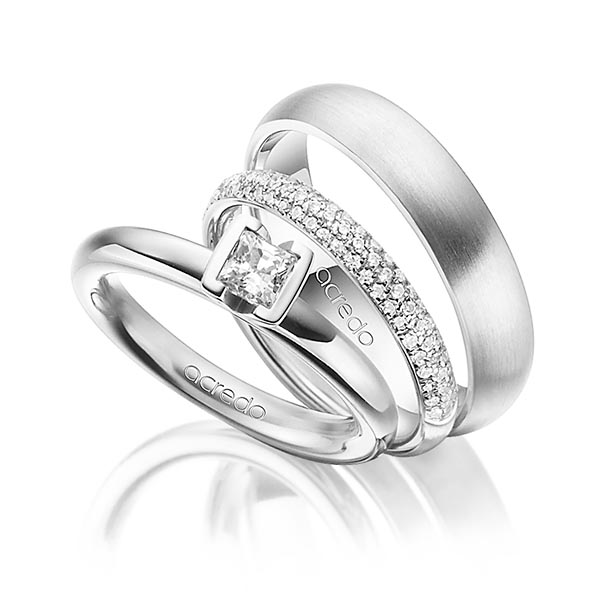 Set in witgoud 18 kt. met 0,4 ct. + in totaal 0,38 ct. Princess-Diamant & Briljant tw,vs tw/si van acredo