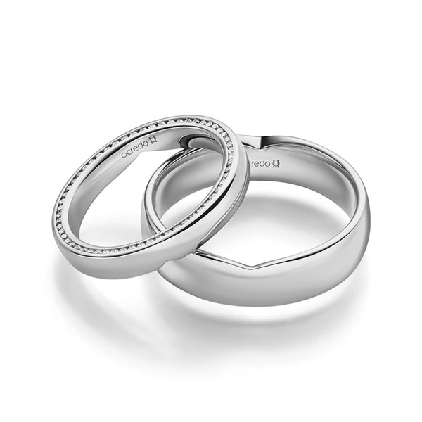 Set Klassieke Memoire-trouwringen in 600 Platinahoudend metaal (60%) volledig gezet met in totaal 0,27 ct. Briljant tw/si van acredo