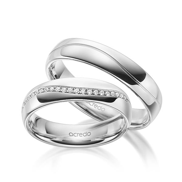 Set Klassieke Memoire-trouwringen in buiten grijsgoud 14 kt. , binnen grijsgoud 14 kt. half gezet met in totaal 0,135 ct. Briljant tw/si van acredo