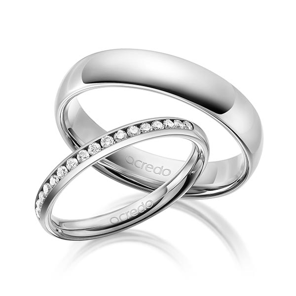 Set klassieke Memoire-trouwringen in buiten grijsgoud 14 kt. , binnen grijsgoud 14 kt. half gezet met in totaal 0,285 ct. Briljant tw/si van acredo