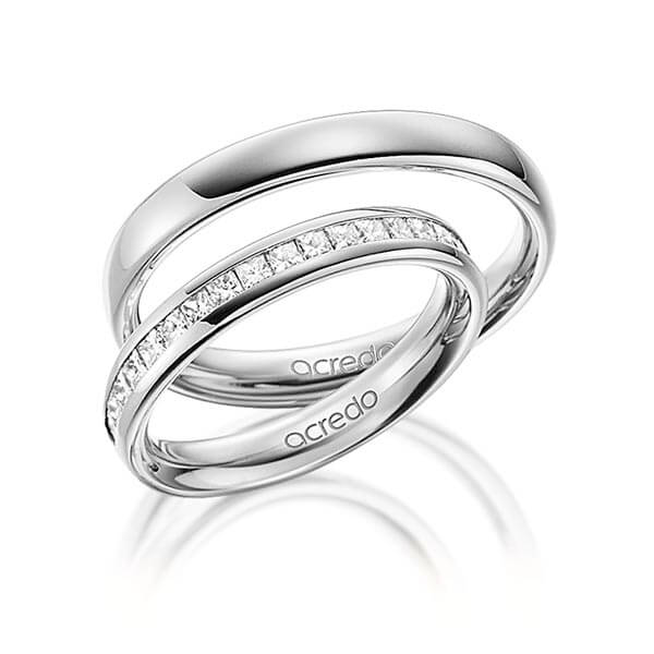 Set klassieke Memoire-trouwringen in buiten grijsgoud 14 kt. , binnen grijsgoud 14 kt. half gezet met in totaal 0,54 ct. Princess-Diamant tw/si van acredo