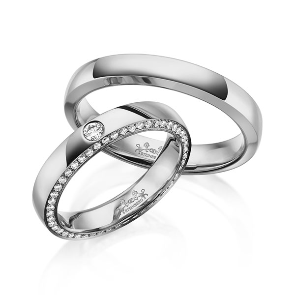 Set klassieke Memoire-trouwringen in buiten grijsgoud 14 kt. , binnen grijsgoud 14 kt. volledig gezet met in totaal 0,34 ct. Briljant tw/si van Steinberg