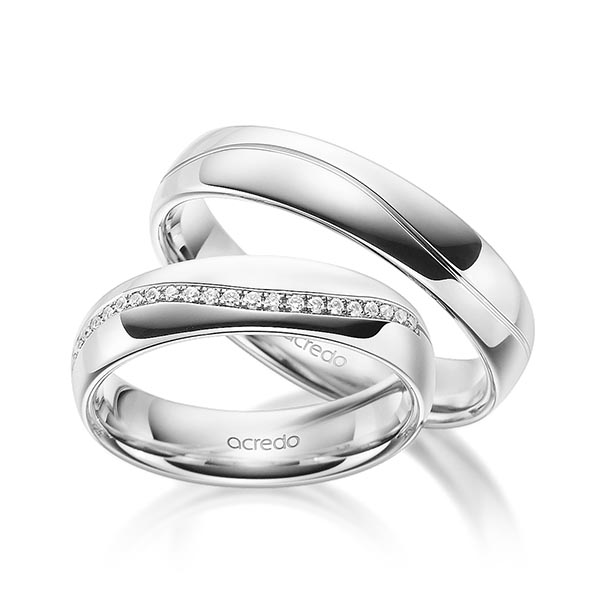Set Klassieke Memoire-trouwringen in buiten witgoud 14 kt. , binnen witgoud 14 kt. half gezet met in totaal 0,135 ct. Briljant tw/si van acredo