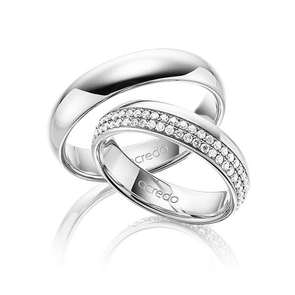 Set klassieke Memoire-trouwringen in buiten witgoud 14 kt. , binnen witgoud 14 kt. volledig gezet met in totaal 0,752 ct. Briljant tw/si van acredo - A-1536-7