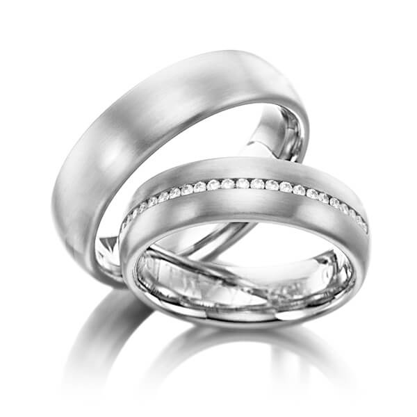 Set klassieke Memoire-trouwringen in edelstaal volledig gezet met in totaal 0,384 ct. Briljant tw/si van Eternal Touch
