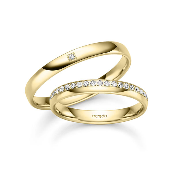 Set klassieke Memoire-trouwringen in geelgoud 14 kt. half gezet met in totaal 0,184 ct. Briljant tw,vs tw/si van acredo