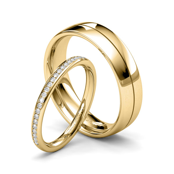 Set klassieke Memoire-trouwringen in geelgoud 14 kt. half gezet met in totaal 0,184 ct. Briljant tw/si van acredo