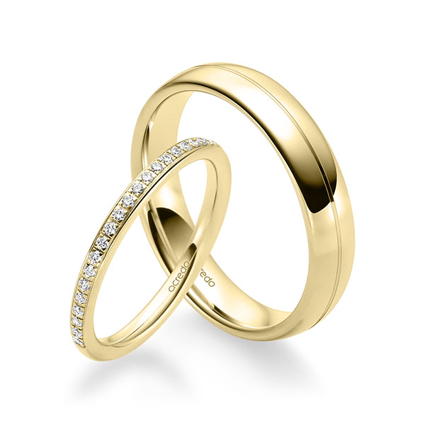 Set klassieke Memoire-trouwringen in geelgoud 14 kt. half gezet met in totaal 0,184 ct. Briljant tw/si van acredo