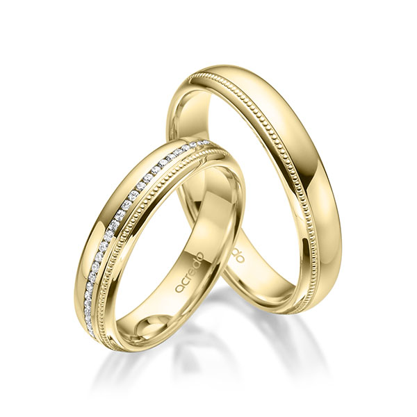 Set Klassieke Memoire-trouwringen in geelgoud 14 kt. volledig gezet met in totaal 0,285 ct. Briljant tw/si van acredo