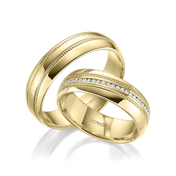 Set Klassieke Memoire-trouwringen in geelgoud 14 kt. volledig gezet met in totaal 0,28 ct. Briljant tw/si van acredo