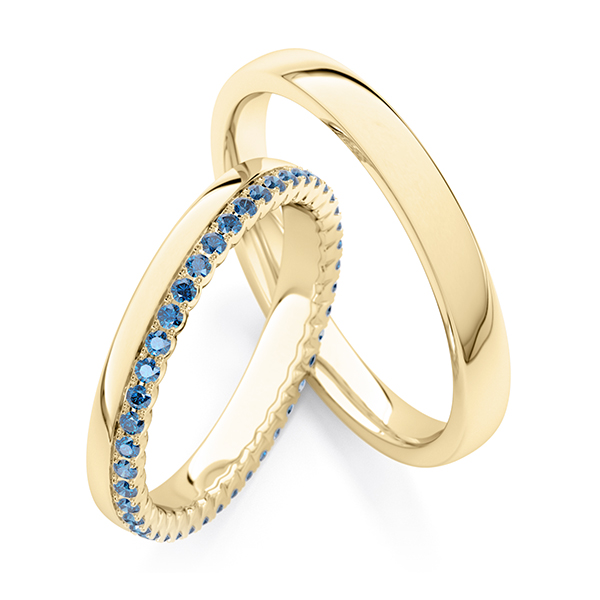 Set Klassieke Memoire-trouwringen in geelgoud 14 kt. volledig gezet met in totaal 0,41 ct. oceanblue van Steinberg