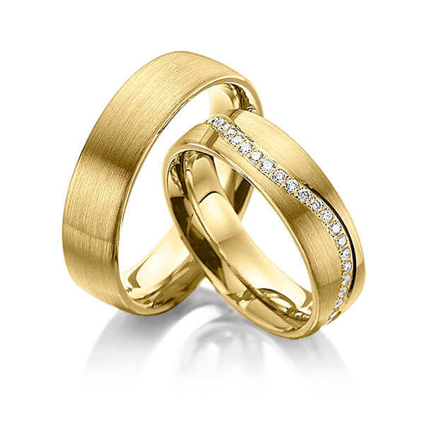 Set klassieke Memoire-trouwringen in geelgoud 14 kt. volledig gezet met in totaal 0,43 ct. Briljant tw/si van Steinberg