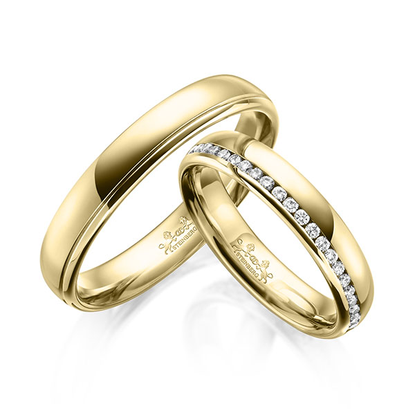 Set klassieke Memoire-trouwringen in geelgoud 14 kt. volledig gezet met in totaal 0,45 ct. Briljant tw/si van Steinberg