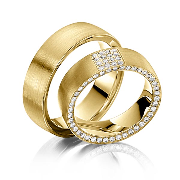 Set klassieke Memoire-trouwringen in geelgoud 14 kt. volledig gezet met in totaal 0,56 ct. Briljant tw/si van Steinberg