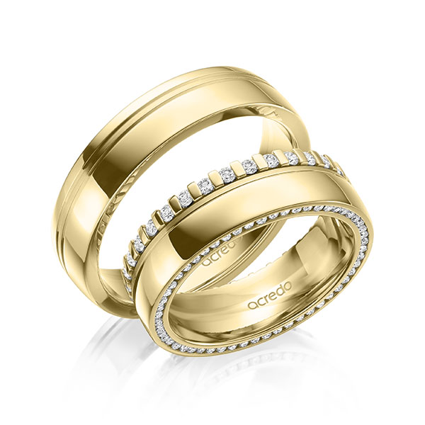 Set Klassieke Memoire-trouwringen in geelgoud 14 kt. volledig gezet met in totaal 0,75 ct. Briljant tw/si van acredo