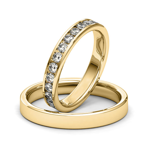Set klassieke Memoire-trouwringen in geelgoud 14 kt. volledig gezet met in totaal 1,3 ct. Briljant tw/si van Merii