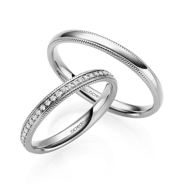 Set Klassieke Memoire-trouwringen in grijsgoud 14 kt. half gezet met in totaal 0,135 ct. Briljant tw/si van acredo