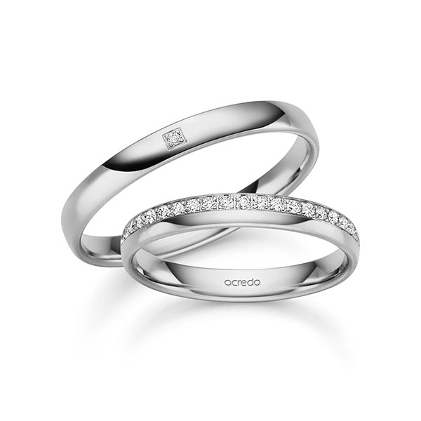Set klassieke Memoire-trouwringen in grijsgoud 14 kt. half gezet met in totaal 0,184 ct. Briljant tw,vs tw/si van acredo