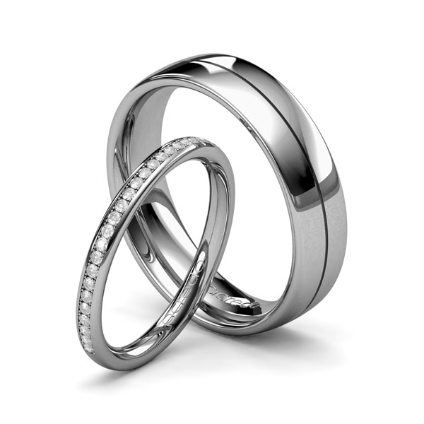 Set klassieke Memoire-trouwringen in grijsgoud 14 kt. half gezet met in totaal 0,184 ct. Briljant tw/si van acredo