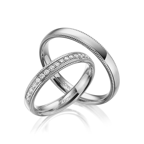 Set Klassieke Memoire-trouwringen in grijsgoud 14 kt. half gezet met in totaal 0,285 ct. Briljant tw/si van acredo