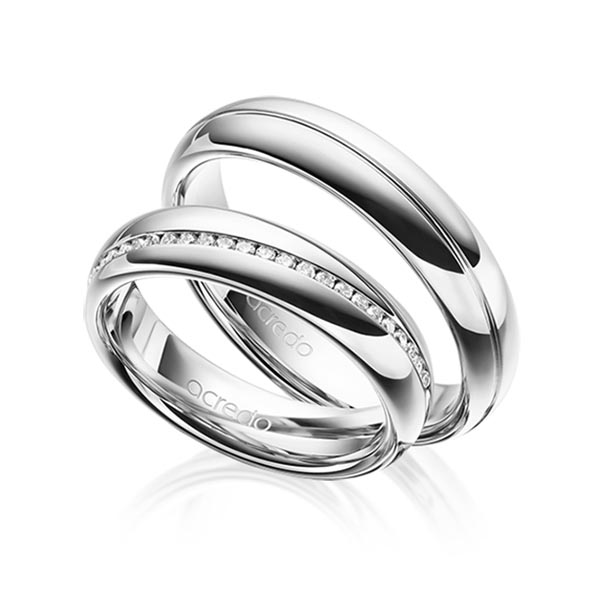 Set Klassieke Memoire-trouwringen in grijsgoud 14 kt. half gezet met in totaal 0,2 ct. Briljant tw/si van acredo