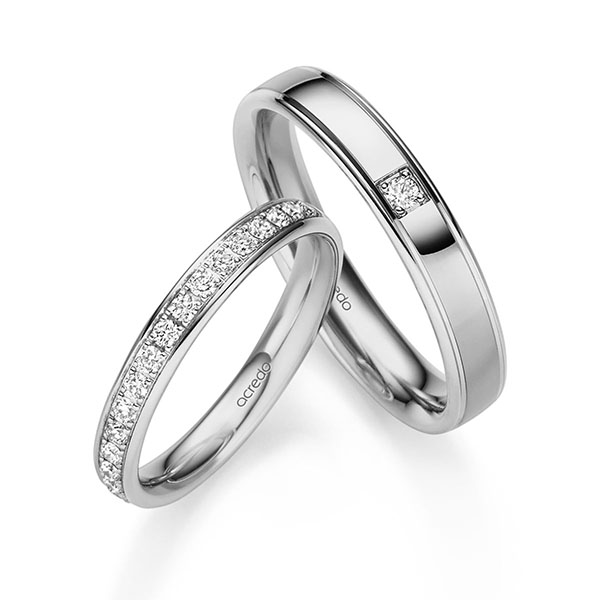 Set Klassieke Memoire-trouwringen in grijsgoud 14 kt. half gezet met in totaal 0,3 ct. Briljant tw/si van acredo
