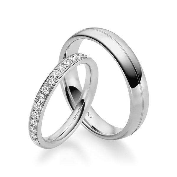 Set Klassieke Memoire-trouwringen in grijsgoud 14 kt. half gezet met in totaal 0,4 ct. Briljant tw/si van acredo
