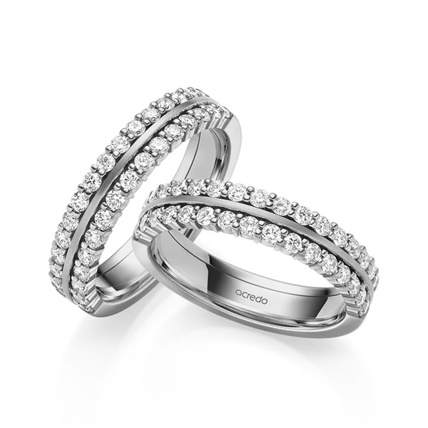 Set Klassieke Memoire-trouwringen in grijsgoud 14 kt. half gezet met in totaal 1,2 ct. tw/si van acredo