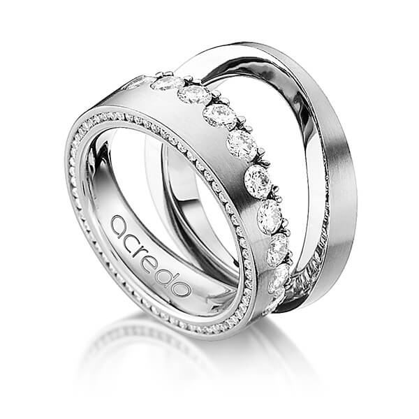 Set klassieke Memoire-trouwringen in grijsgoud 14 kt. half gezet met in totaal 1,385 ct. Briljant tw/si van acredo - A-1238-6 Set klassieke Memoire-trouwringen in grijsgoud 14 kt. half gezet met in totaal 1,385 ct. Briljant tw/si van acredo - A-1238-6