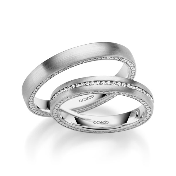 Set Klassieke Memoire-trouwringen in grijsgoud 14 kt. volledig gezet met in totaal 0,295 ct. Briljant tw/si van acredo