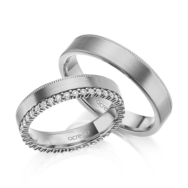 Set Klassieke Memoire-trouwringen in grijsgoud 14 kt. volledig gezet met in totaal 0,39 ct. tw/si van acredo