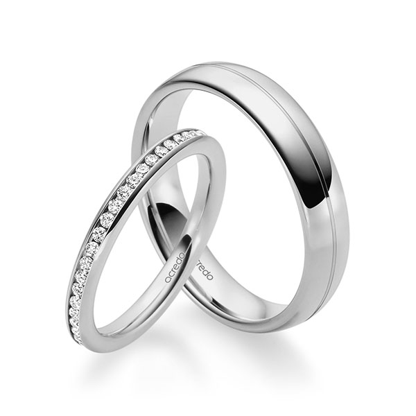 Set klassieke Memoire-trouwringen in grijsgoud 14 kt. volledig gezet met in totaal 0,46 ct. Briljant tw/si van acredo - A-1681-5 Set klassieke Memoire-trouwringen in grijsgoud 14 kt. volledig gezet met in totaal 0,46 ct. Briljant tw/si van acredo - A-1681-5