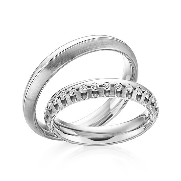 Set Klassieke Memoire-trouwringen in grijsgoud 14 kt. volledig gezet met in totaal 0,72 ct. Briljant tw/si van Steinberg