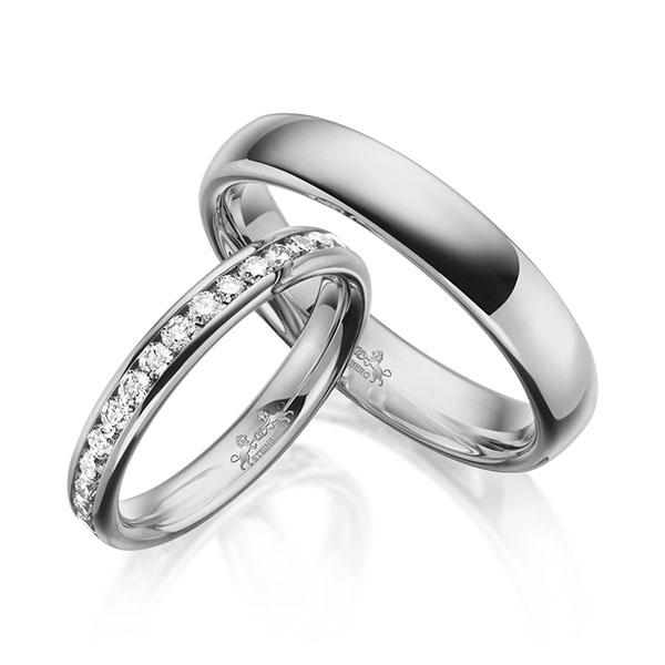 Set klassieke Memoire-trouwringen in grijsgoud 14 kt. volledig gezet met in totaal 0,99 ct. Briljant tw/si van Steinberg
