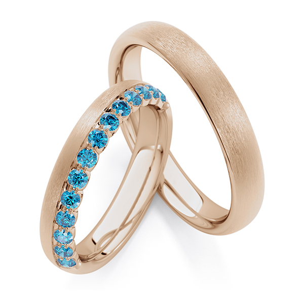 Set Klassieke Memoire-trouwringen in Peach-Gold 585 half gezet met in totaal 0,39 ct. skyblue van Steinberg