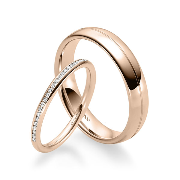 Set klassieke Memoire-trouwringen in roodgoud 14 kt. half gezet met in totaal 0,14 ct. Briljant tw/si van acredo