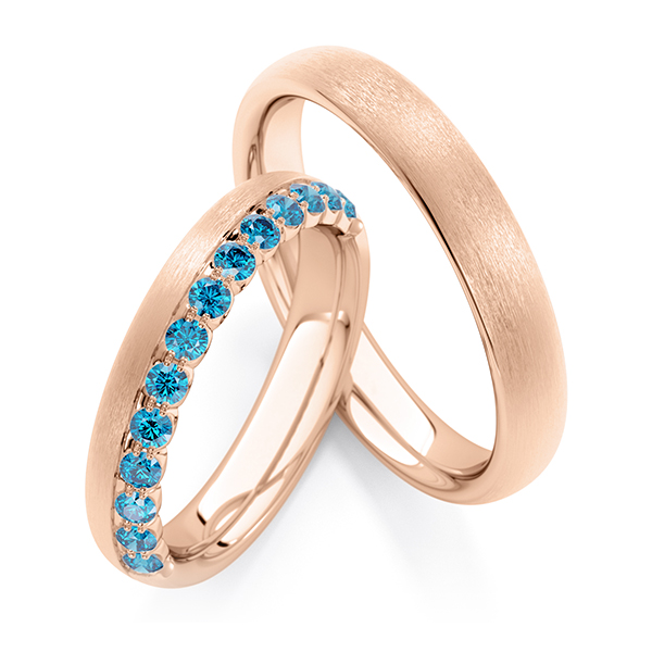 Set Klassieke Memoire-trouwringen in roodgoud 14 kt. half gezet met in totaal 0,39 ct. skyblue van Steinberg