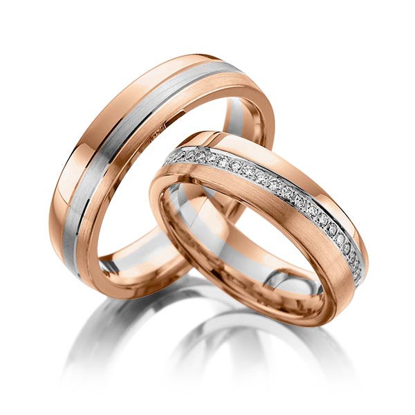 Set klassieke Memoire-trouwringen in roodgoud 14 kt. volledig gezet met in totaal 0,74 ct. Briljant tw/si van Steinberg
