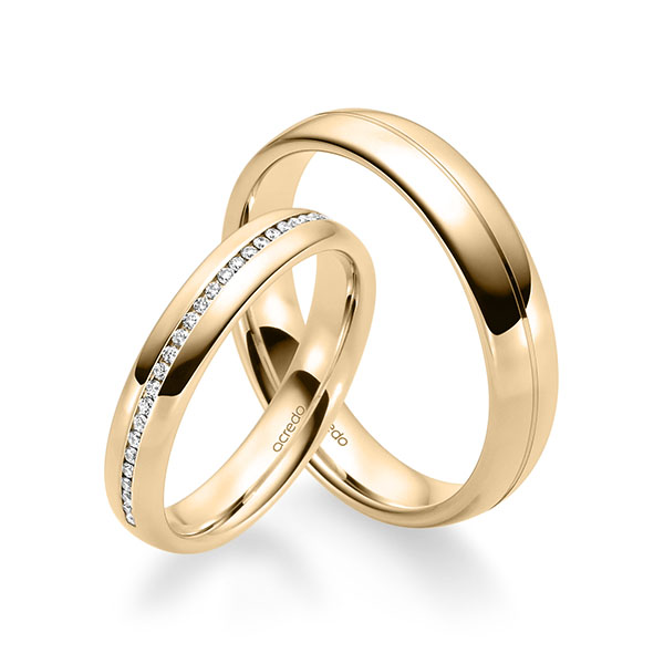 Set klassieke Memoire-trouwringen in roségoud 14 kt. half gezet met in totaal 0,14 ct. Briljant tw/si van acredo