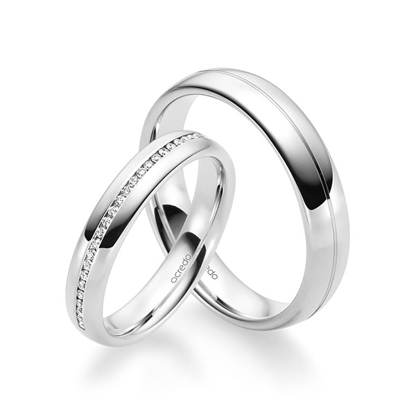 Set klassieke Memoire-trouwringen in witgoud 14 kt. half gezet met in totaal 0,14 ct. Briljant tw/si van acredo