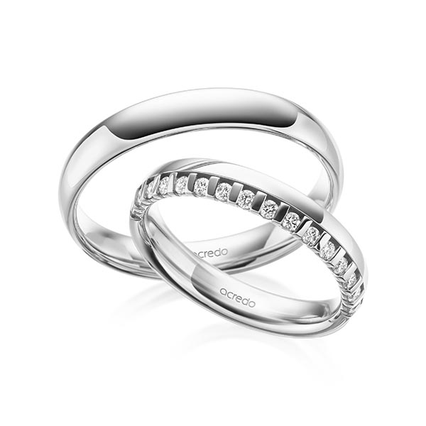 Set klassieke Memoire-trouwringen in witgoud 14 kt. half gezet met in totaal 0,225 ct. tw/si van acredo