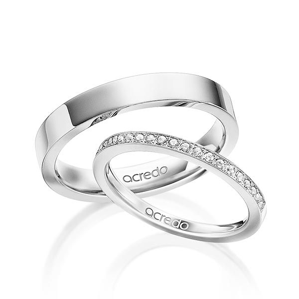 Set klassieke Memoire-trouwringen in witgoud 14 kt. half gezet met in totaal 0,22 ct. Briljant tw/si van acredo - A-1597-1 Set klassieke Memoire-trouwringen in witgoud 14 kt. half gezet met in totaal 0,22 ct. Briljant tw/si van acredo - A-1597-1