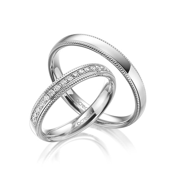 Set Klassieke Memoire-trouwringen in witgoud 14 kt. half gezet met in totaal 0,285 ct. Briljant tw/si van acredo