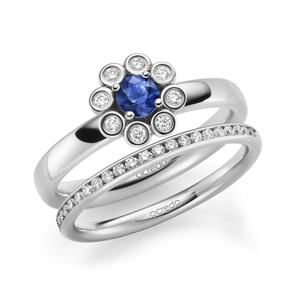 Set klassieke Memoire-trouwringen in witgoud 14 kt. half gezet met in totaal 0,59 ct. Briljant tw/si Saffier Blauw van acredo