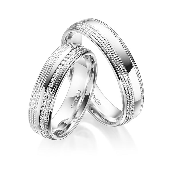Set Klassieke Memoire-trouwringen in witgoud 14 kt. volledig gezet met in totaal 0,285 ct. Briljant tw/si van acredo