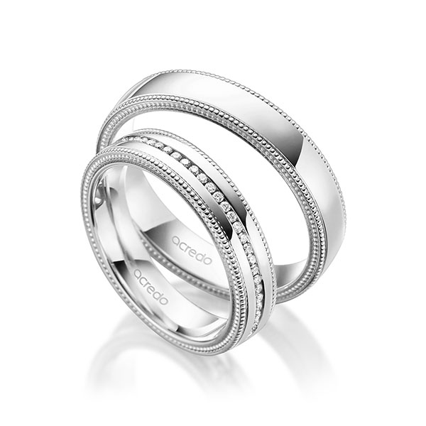 Set Klassieke Memoire-trouwringen in witgoud 14 kt. volledig gezet met in totaal 0,295 ct. Briljant tw/si van acredo
