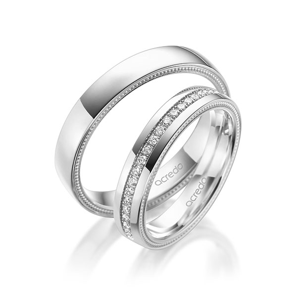 Set Klassieke Memoire-trouwringen in witgoud 14 kt. volledig gezet met in totaal 0,44 ct. Briljant tw/si van acredo