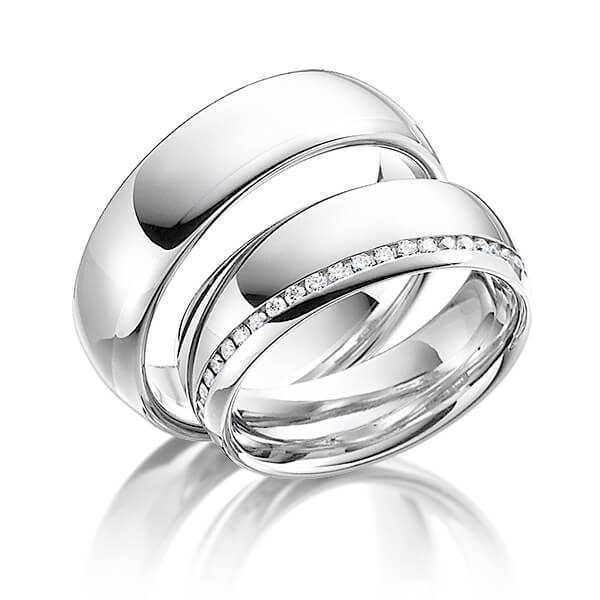 Set klassieke Memoire-trouwringen in witgoud 14 kt. volledig gezet met in totaal 0,48 ct. Briljant tw/si van Steinberg