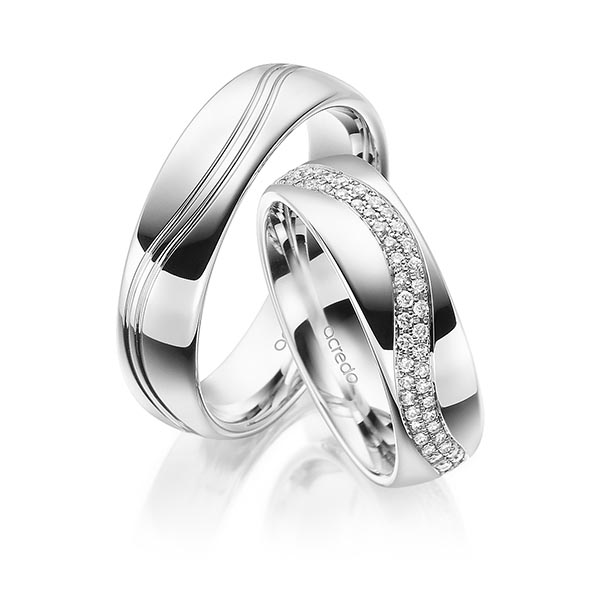 Set Klassieke Memoire-trouwringen in witgoud 14 kt. volledig gezet met in totaal 0,56 ct. Briljant tw,vs van acredo